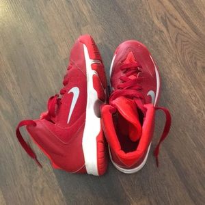 Red Nike kids basketball shoes